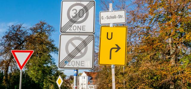 zone and u-turn road signs by Sangga Rima Roman Selia courtesy of Unsplash.